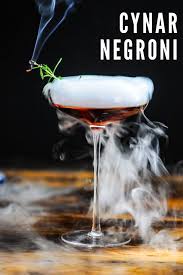 A Cynar Negroni Perfect For Halloween With The Dry Ice Fog It S Served With This Amaro Liqueur Based Co Blackcurrant Wine Negroni Recipe Classic Gin Cocktails