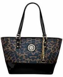 This premium and strong logo is ideal for elite brands like golf, nautical, classy invitations, weddings, formal proposals, luxury industry like hotels, wine, fashion clothes, perfumes, or any other classy. Purse With Lion Logos