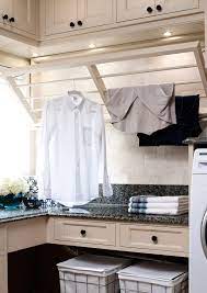 If you need something more portable that you can move from laundry room to bedroom, opt for a mobile clothes rack on wheels. Laundry Drying Rack Houzz
