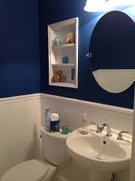 Cottage Or Beach Look Powder Room With White Beadboard Built In Shelf And Dark Blue Walls Digni Dark Blue Bathrooms Bathroom Colors Blue Best Bathroom Colors