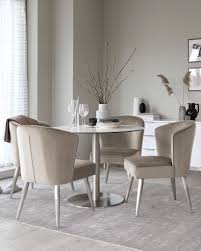Discover the design world's best velvet dining chairs at perigold. Danetti Luxe Champagne Velvet Chairs Paired With A Durable And Elegant Ceramic Marble Table All Finished With Modern Metallic Accents This Mellow And Romeo Dining Set Is Perfect For Switching