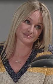 What is the dress worn by Sharon Neumann