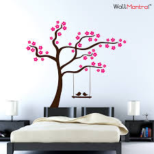 Wall stickers, also known as wall decals, have become an essential dcor option for many houses. Shop Romantic Tree Wall Sticker With Pink Flowers Online Wallmantra