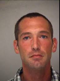 Man arrested after allegedly shooting at truck