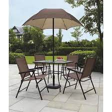 Your outdoor patio furniture should look and feel as great as your indoor furnishings do. Mainstays Sand Dune 6 Piece Folding Patio Dining Set With Umbrella Seats 4 Walmart Com Patio Set With Umbrella Outdoor Patio Set Garden Patio Furniture