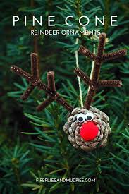 Pinecones of various shapes and sizes come together in this gorgeous tree decoration. Pine Cone Reindeer Ornaments Fireflies And Mud Pies Christmas Crafts Christmas Ornaments To Make Reindeer Craft