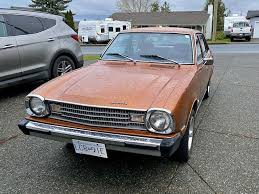 Image result for Spitfire Orange 1978 Colt