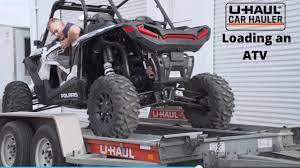 I will be moving my daughter from louisville ky to some of the tool rental places around here (ohio) have car hauler trailers. Loading An Atv On A U Haul Car Hauler Youtube