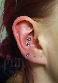 Triple Conch Piercing With 14k Gold Jewelry By Bvla And Neometal By Ryan Ouellette At Precision Body Art Unique Ear Piercings Conch Piercing Cute Ear Piercings