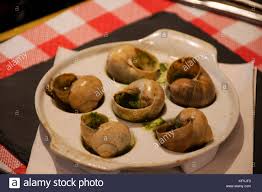Escargots Au Beurre Ail Et Persil Recette Or Escargots In Garlic Stock Photo Alamy