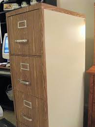 How to cover kitchen cabinets with contact paper. File Cabinet Makeover How To Cover A File Cabinet With Contact Paper Filing Cabinet File Cabinet Makeover Cabinet Makeover