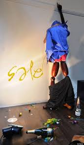 A Urinating Mannequin Makes An Eye Catching Window Display Window Display Visual Merchandising Displays Clothing Displays