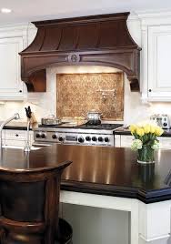 Kitchen With White Cabinetry And Dark Wood Detail Trendy Farmhouse Kitchen Kitchen Hoods Kitchen Range Hood