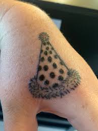 Dotwork tattoos and simplistic, minimalist tattoos are all the rage right now, and for good reason. Party Hat Tattoo Tattoos Paw Print Tattoo Paw Print