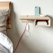 One good option is a small nightstand. Plywood Floating Bedside Table Pair Etsy Floating Bedside Table Pair Bedside Tables Bedside Table Diy