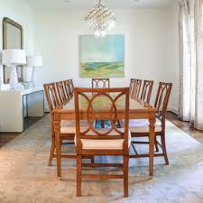 Today's buyer is really loving the gold and silver finishes with ornate carvings and massive table size. Dining Room Design By Blue Print Interiors Landscape By Karen Smidth Blue Print Satin Wood Din Furniture Boutique Home Furnishing Stores Dining Room Design