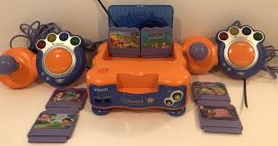 Great Vtech Vsmile Learning System Plugs Into Tv Includes 2 Controllers And 6 Games Console Requires 3 C Sized Batteries Not Vtech Fun Learning Learning