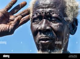 Sudan, White Nile, Kodok, ex-Fachoda, old member of the Shilluk guard of  the royal palace, wearing ritual scarifications Stock Photo