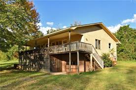 Collection of hillside plans from nationally recognized home designers Backwards House Walkout Basement In Front Of House