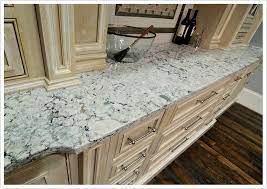 Our cabinets will be maple with a honey stain, we'll pick out our floors last. Praa Sands Cambria Quartz Bath Granite Denver