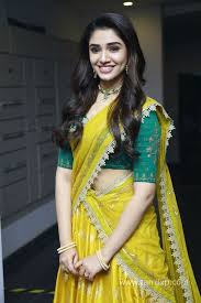 She knows how to carry a saree and she looks wonderful. Tamil Actress Krithi Shetty Advaitha Saree Photos Images Stills Gallery