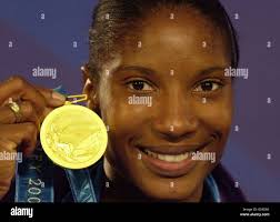 Great britains denise lewis celebrates winning gold medal in heptathlon  hi-res stock photography and images