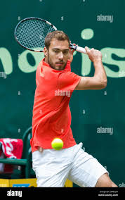 Jerzy Janowicz (POL) plays a shot in the second round of the ATP Gerry  Weber Open Tennis Championships at Halle, Germany. Janowicz won 6-2, 5-7,  6-2 Stock Photo