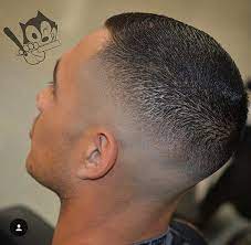 A fade haircut adds a striking contrast to the pomp's fullness with leaner hair on the sides. Pin On Short Hair Cut