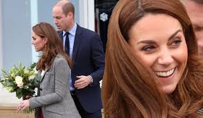 Unflappable' Kate and William share a laugh after she trips up during  charity visit