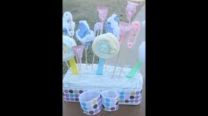 Print out these easy instructions and send along to shower guests inviting them to make a pop or two to bring to your baby shower. Updated Version Of Diy Washcloth Lollipops And Baby Sock Roses Baby Shower Youtube