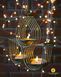 Indotribe festive diyas festive decorations oil lamp diwali lights clay diyas for diwali tea light holder indian decor diwali gifts diwali decor puja items indian decorations diwali candles. May This Festival Of Lights Brings A Lot Of Brightness And Joy In Your Life Celebrate With Our Exclusive Tea Light Holder Hanging Tea Lights Tea Light Holder