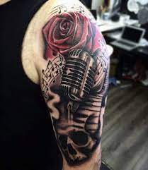 The rose tattoo is another old school, or traditional tattoo designs which has gained in popularity among the tattoo community over the decades, and just like the heart tattoo is often seen in combination with a dagger, skulls, swallow, or a banner that reads mom, mother, or any other name on it. 90 Microphone Tattoo Designs For Men Manly Vocal Ink