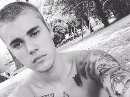 But if you want a more subtle tattoo we recommend having a small cross tattoo on the. Justin Bieber Shows Off His Massive Chest Tattoo In A New Video
