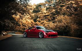 We determined that these pictures can also depict a jdm. Hd Wallpaper Red Volkswagen 5 Door Hatchback Car Nissan 350z Jdm Road Wallpaper Flare