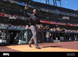 Former San Francisco Giants player Terry Whitfield during a ceremony for  longtime Giants clubhouse manager Mike "Murph" Murphy being inducted into  the team's Wall of Fame before a baseball game between the