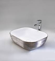 white table mounted wash basin
