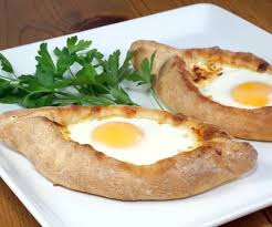 Served with gluten free corn tortilla chips. Adjaruli Khachapuri Georgian Cheese Bread Curious Cuisiniere