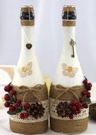 13 Ideas Hermosas Para Decorar Botellas Con Cordon De Henequen Lo Artesanias Con Botellas De Vino Decorar Botellas De Cristal Botellas Decoradas Para Navidad