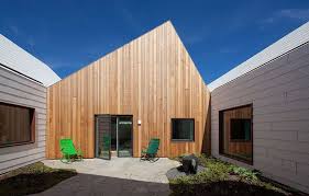 Moderne Holzfassade Fur Ihr Haus Einladend Und Elegant Holzfassade Fassade Fassadenverkleidung