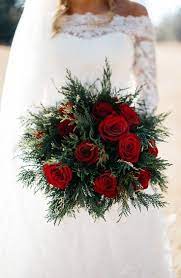 Its a decorative accessory for the image of a girl, an attribute of the main. Beautiful For A Christmas Wedding Red Wedding Flowers Christmas Wedding Bouquets December Wedding Colors