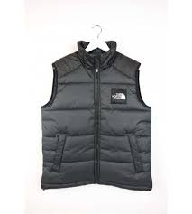 Les cols se veulent modulables et transformables. Doudoune Sans Manches The North Face Noir