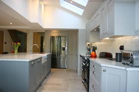 Benjamin moore knoxville gray painted kitchen cabinets look great in combination with a wood finish and white painted walls. In Frame Effect Bespoke Kitchen In Two Shades Of Grey With Large Island Blok Designs Ltd