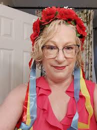 I got these two beautiful headpieces but not sure how to wear them. On top  of the head or pushed forward?