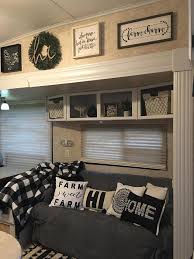 White Painted Trim And Farmhouse Style Decor In Fifth Wheel Rv By Kimberlyn Mcfadden Rv Living Room Camper Decor Living Room Remodel