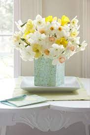 Bring Spring Into Your Home With Cheerful Daffodil Arrangements New England Home Magazine Flower Arrangements Spring Floral Arrangements Daffodils