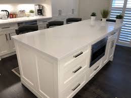 We will also look at the pros and cons of quartz countertops. Painted Island White Quarts Countertop White Shaker Door White Quartz Countertop Home Decor Kitchen