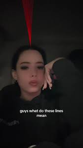 What Does 3 Dots and 2 Lines under Mean Hood