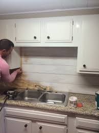 White kitchens will always be a classic and safe choice, but i know there are a lot of people out there tired of that light grey grout, white countertop, brass accents and shiplap. Kitchenette Shiplap Backsplash Clover Lane