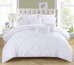 The most common king size comforters material is cotton. Chic Home 10 Piece Hannah Pinch Pleated Ruffled And Pleated Complete King Bed In A Bag Comforter Set White With Sheet Set Amazon Com Au Home