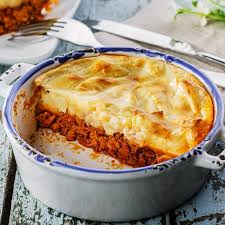 Mash potatoes and add 1/2 cup cheddar cheese, milk, green onion, and butter. Hachis Parmentier French